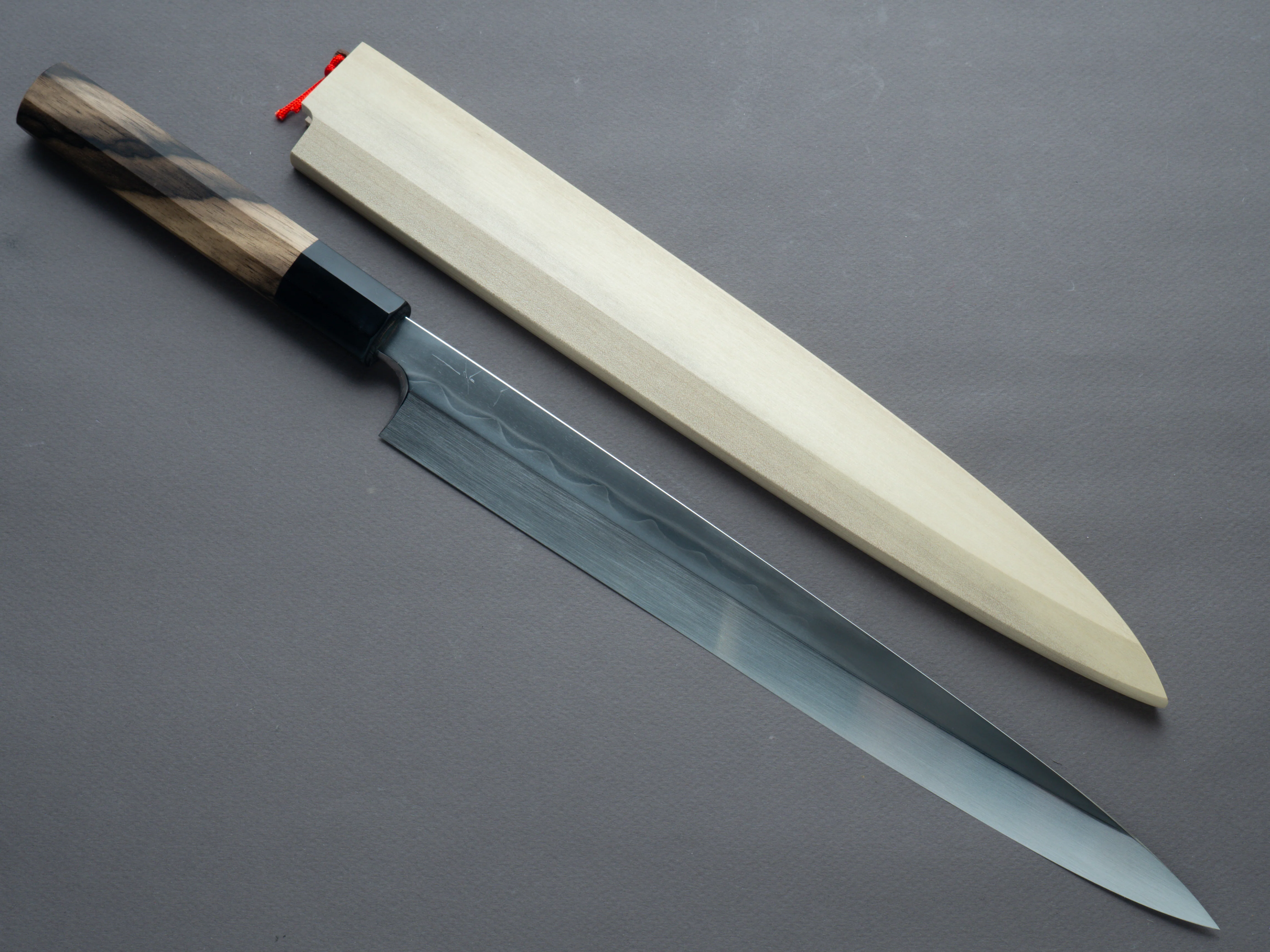Hitohira - Togashi Mizu Honyaki - Blue #1 Tanryumon - 300mm Yanagiba - Kurokaki Persimmon Handle (w/ saya)