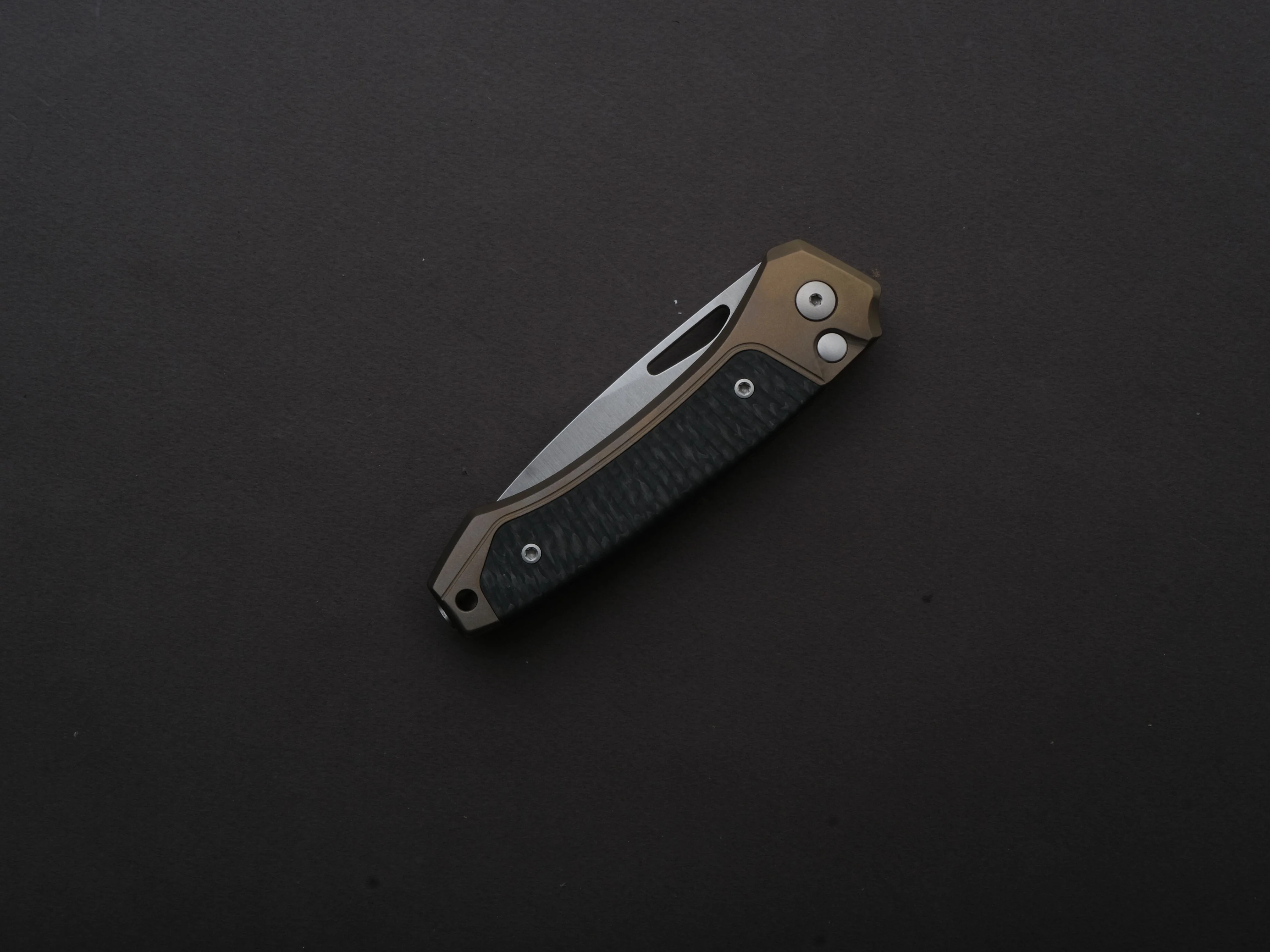lionSTEEL - Folding Knife - Button Lock - Twain - MagnaCut - 80mm - Bronze Titanium Handle w/ Carbon Fiber Inlay - Image 6